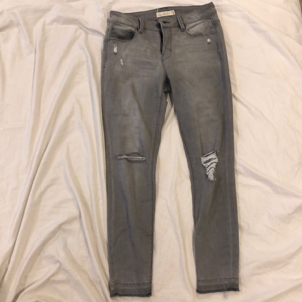 Skinny grey ripped jeans